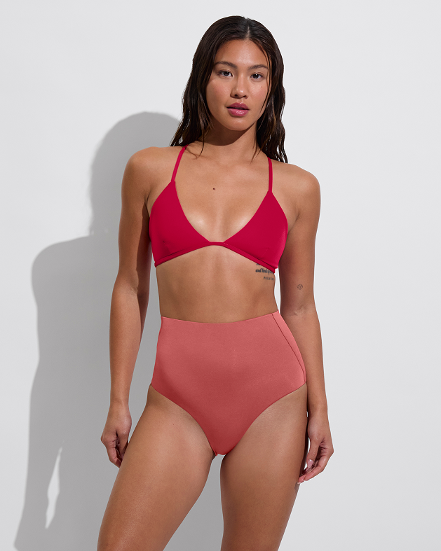 Woman in Reef top in La La Land paired with Hi Tide Bottom in Camp