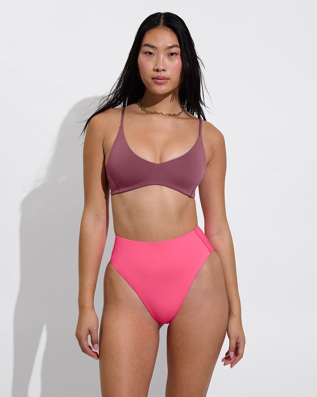 Woman in Sunday top in desert plum paired with hi hi bottom in hot