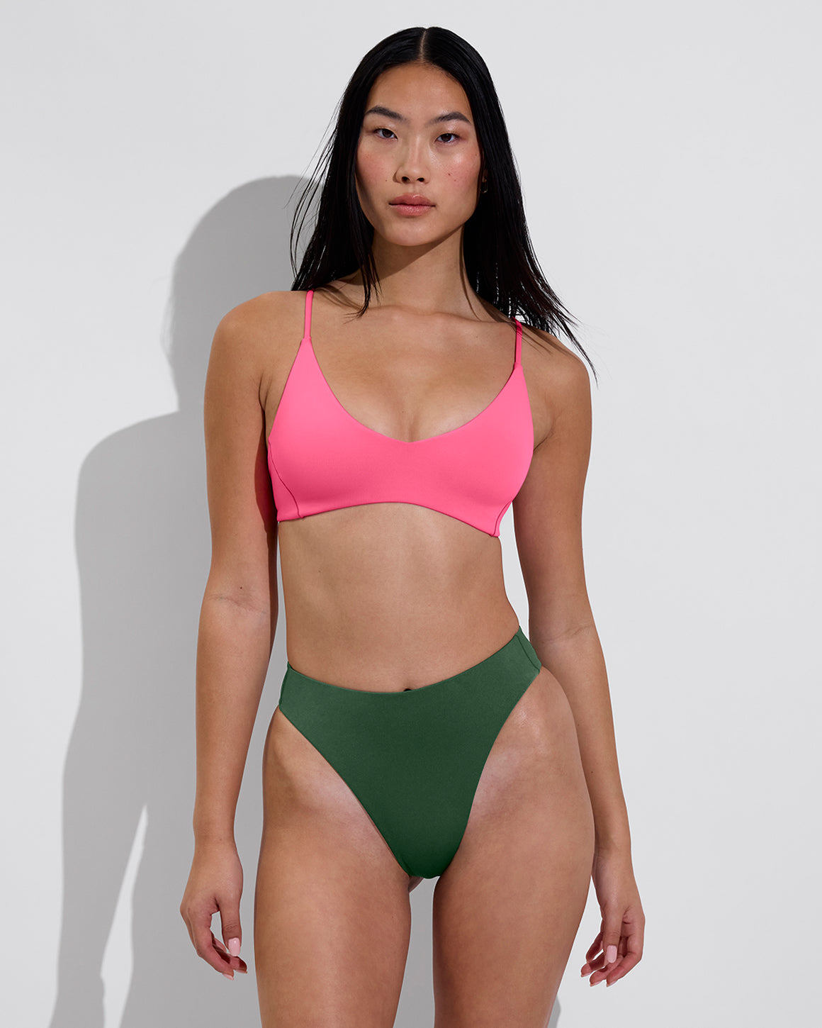 Woman in Sunday Top in Hot paired with Throwback Bottom in Tropics