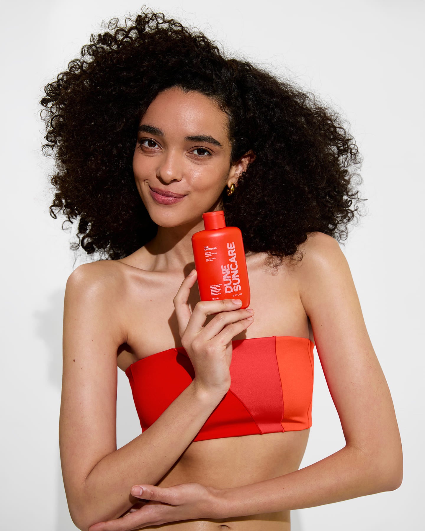 Tubular Top in Sweet Chili Heat / Flare / Aperol with Dune Suncare The Lifeguard Bottle
