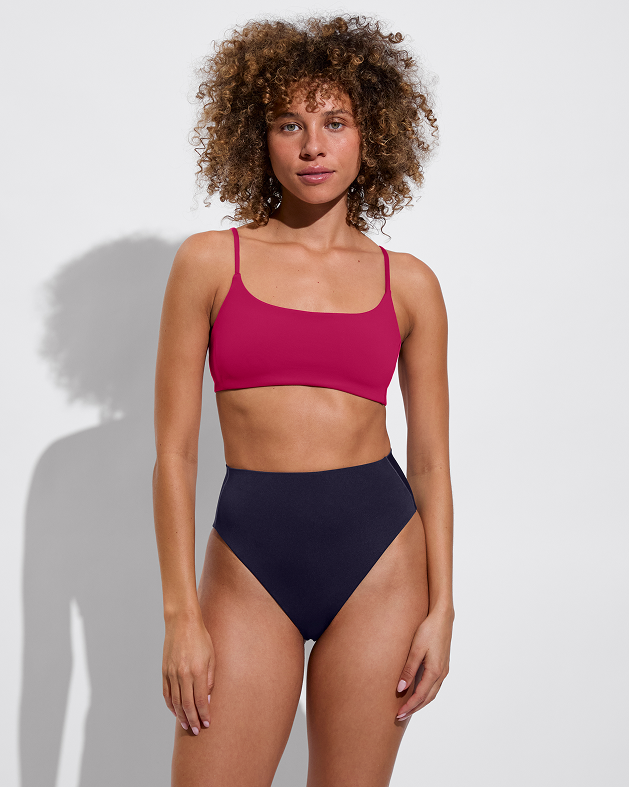 Woman in pool days top in pepper paired with hi hi bottom in sprint