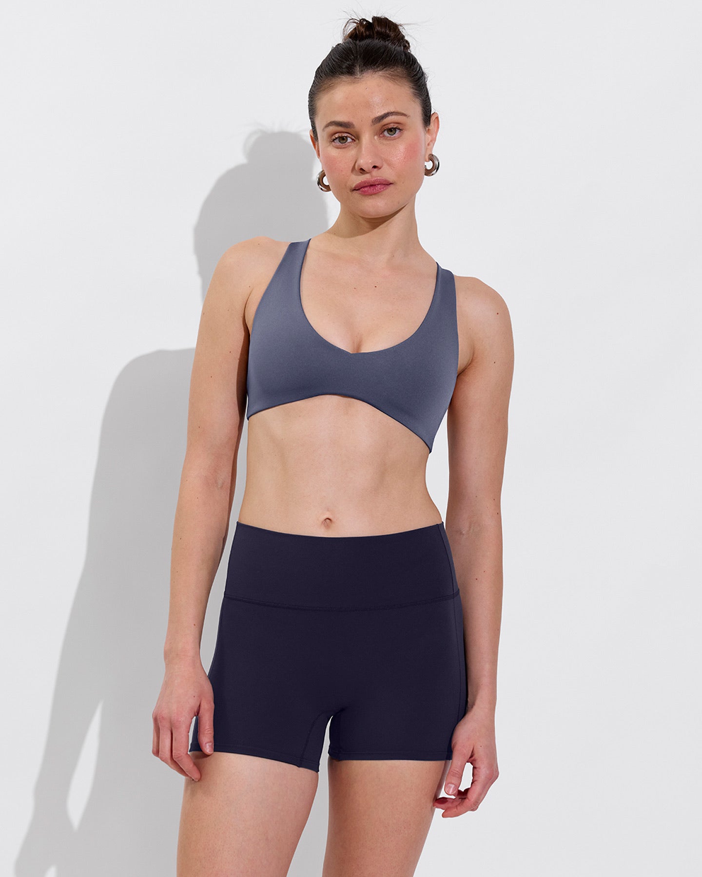 Plunge Top in varsity paired with Ace Short in Sprint