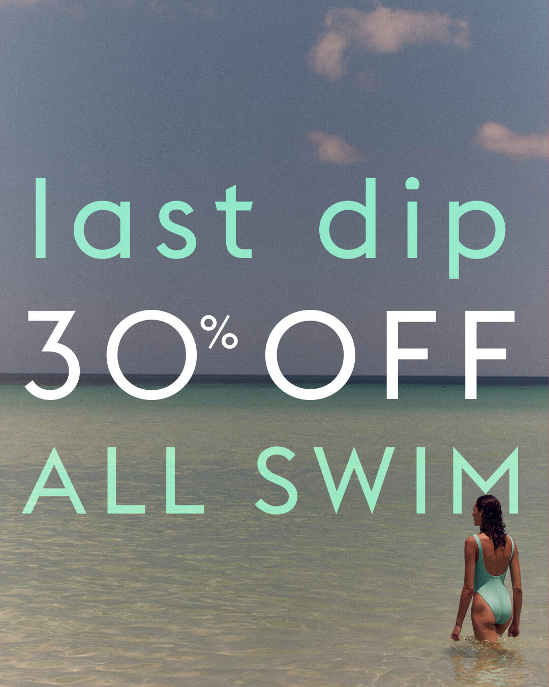 Promotional graphic with the text 'last dip 30% OFF ALL SWIM' over a beach scene, showing a woman in a light aqua one-piece swimsuit standing in shallow water under a blue sky.
