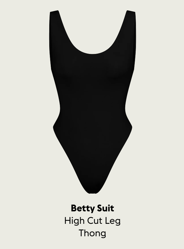 Black Betty Suit high cut leg thong on a light gray background