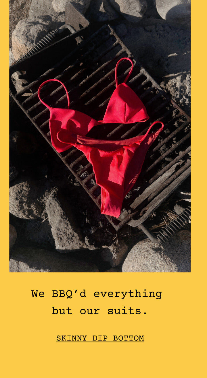 Sandy Top and Skinny Dip Thong in Sweet Chili Heat posed on a grill