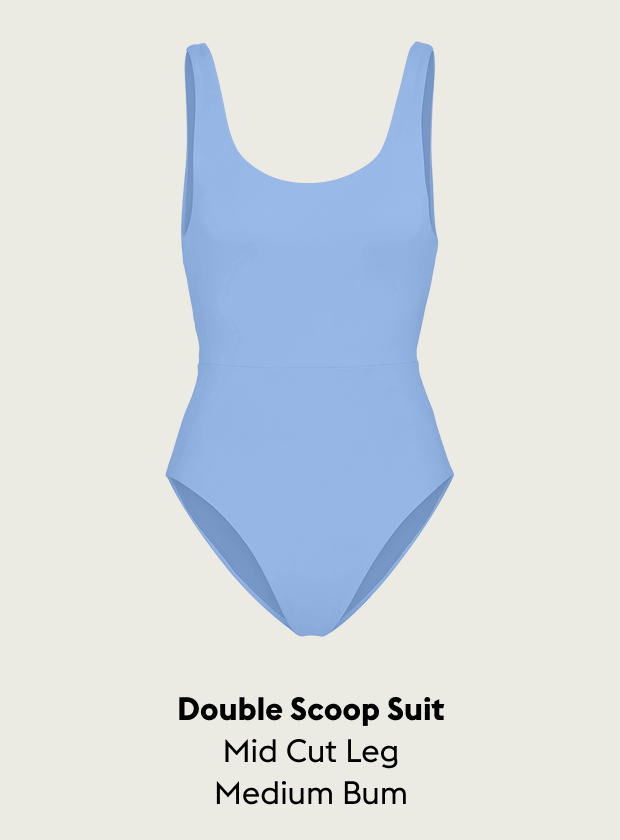 Blue skies swimsuit with 'Double Scoop Suit' text on a light gray background